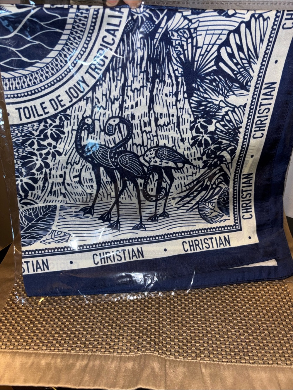 Fashion design patterned silk scarf in navy and cream